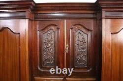Antique Large Victorian carved breakfront combination triple door wardrobe