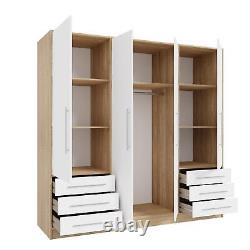Large 4 Door Bedroom Wardrobe white on oak. Hanging rail, shelves and 6 drawers