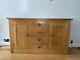 Large Solid Oak Sideboard. 2 Doors 4 Drawers. Brilliant Condition