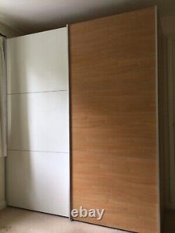 Large quadruple mfi wardrobe / closet system with two large sliding doors