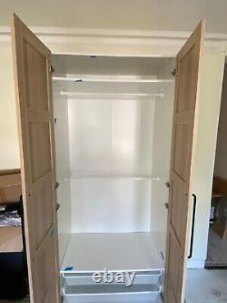 Grande armoire à deux portes avec deux tiroirs