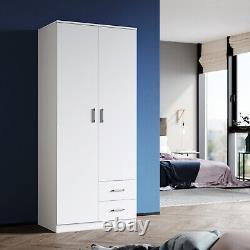 Grande armoire à deux portes en bois blanc mat avec grand espace de rangement, penderie et tiroirs.