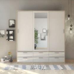 Grande armoire triple en chêne blanc laqué à portes coulissantes et tiroirs avec miroir