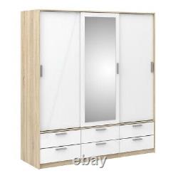 Grande armoire triple en chêne blanc laqué à portes coulissantes et tiroirs avec miroir